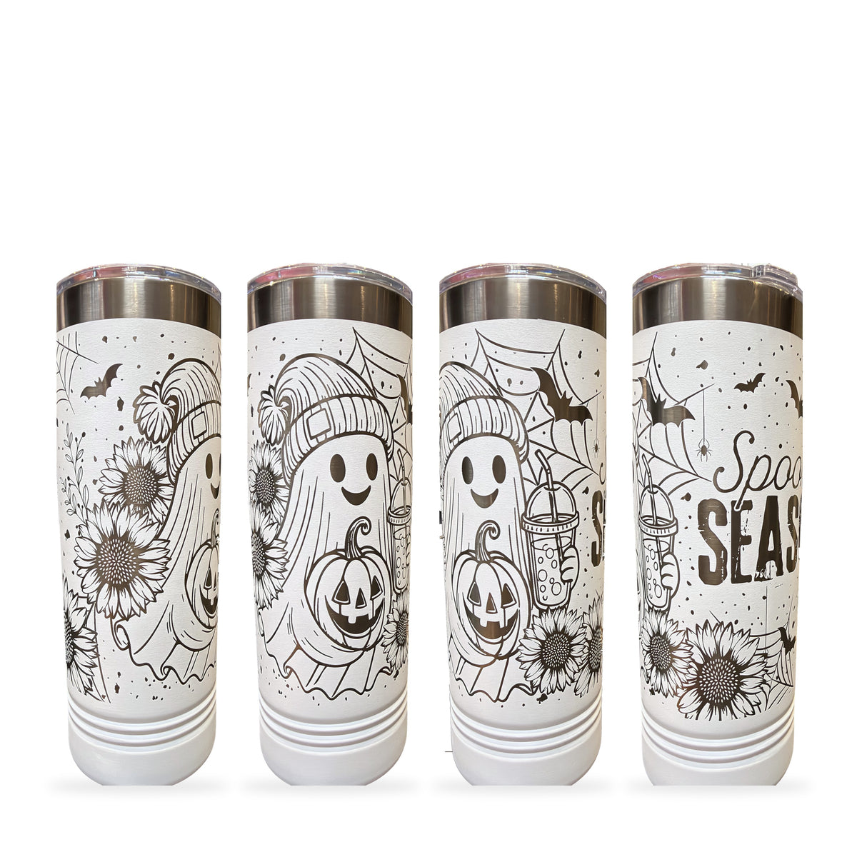 Four views of a white skinny tumbler laser engraved with a full-wrap Spooky Season ghost and sunflowers design, on a white background